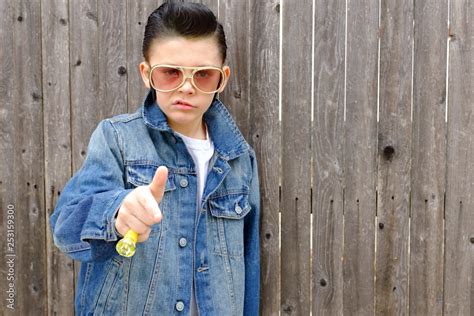 Elvis kid,Boy child dressed as 1950s style greaser ,rockabilly wearing ...