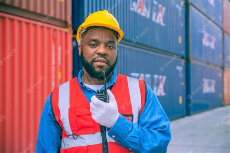 Premium Photo | Worker container shipment worker working in container ...