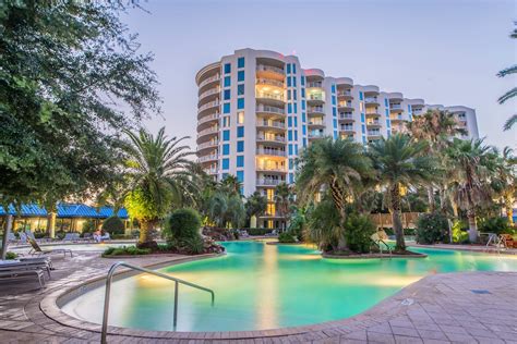 Lovely Palms of Destin Lagoon Pool lit up at night Destin Resorts ...