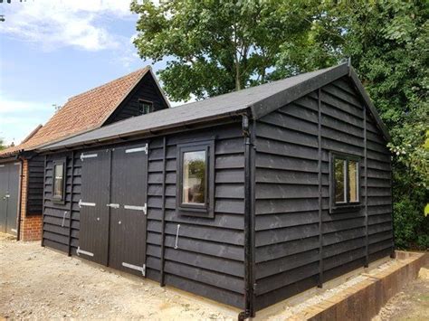 Wooden Garage Feather Edge Cladding Painted Black | Timber garage ...