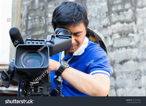 Cameraman Filming Outdoor Event Stock Photo 374145424 | Shutterstock