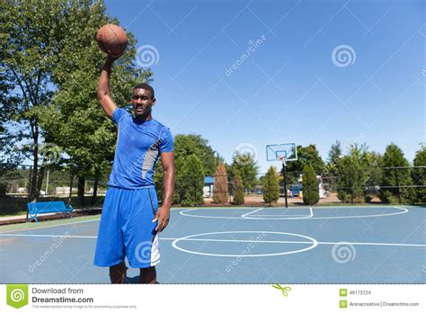 Basketball Player Palming the Ball Stock Photo - Image of active, black ...