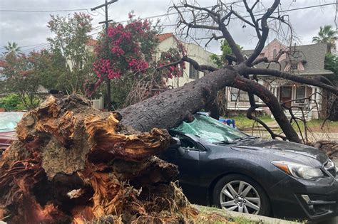 California reels from floods as downgraded storm barrels on ...