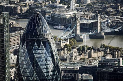 Aerial view of The Gherkin office building and Tower Bridge over the ...