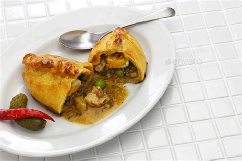 saltena, bolivian juicy filling empanada Stock Photo by motghnit ...