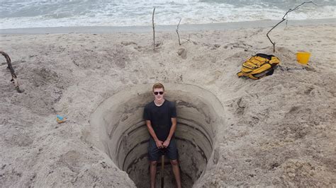 Last summer I dug a massive hole on the beach just for the pure fun of ...