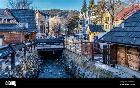 Zakopane, Poland, March 2019 Famous Krupowki promenade, main shopping ...