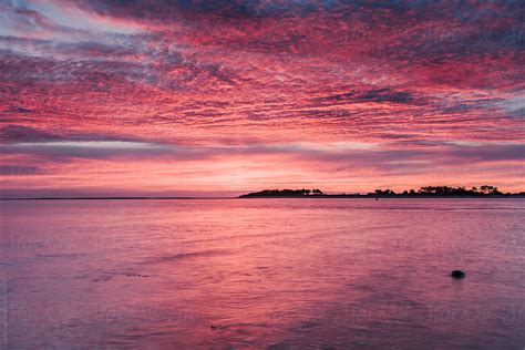 "Pink Dawn Sky Reflected In The Surface Of The Sea. Norfolk, UK." by ...