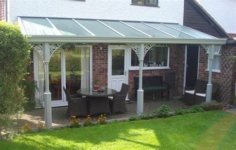 a house with a patio and glass roof