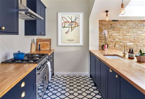 The patterned tiles in this cool blue kitchen work brilliantly to add a ...