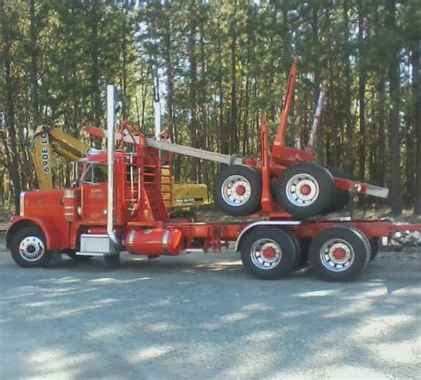 Red Peterbilt Truck with Giant Tires