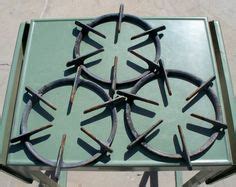 Old Gas Stove Grates turned into hot plate trivets. Remove all grease ...