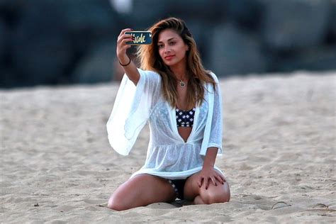 NICOLE SCHERZINGER Taking a Selfie on the Beach in Hawaii – HawtCelebs