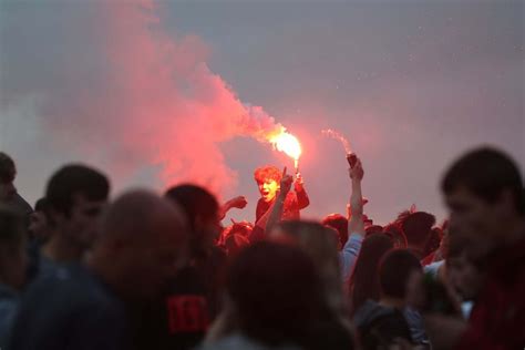 Liverpool fans told to 'go home' as title celebrations spill into ...