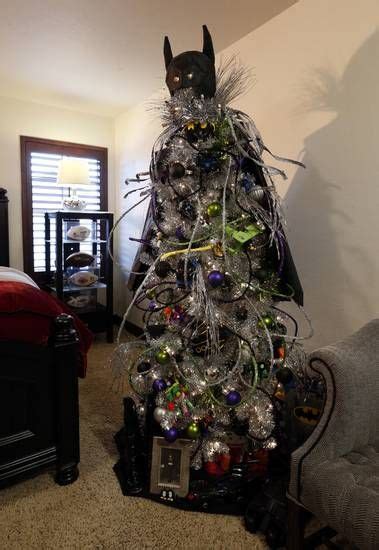 A Batman-themed Christmas tree decorates a child's room at Mike and ...