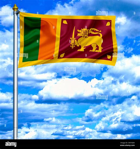 Sri Lanka waving flag against blue sky Stock Photo - Alamy