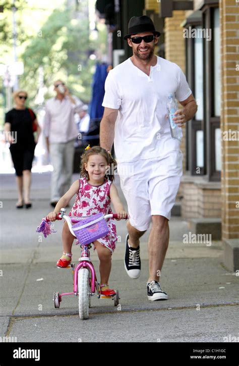 Hugh Jackman takes their daughter Ava Jackman out on her bike. New York ...