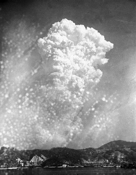 View of mushroom cloud over Hiroshima as seen from the naval arsenal at ...