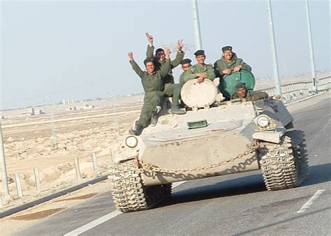 Iraqi military men riding on tank | Iraqi military men ridin… | Flickr