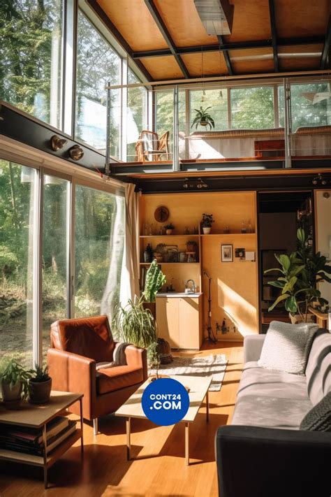 a living room filled with furniture and windows next to a wooden floor ...