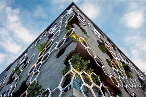 Hexagonal Facade Design Emerged as a Buffer of Stratifying Elements ...