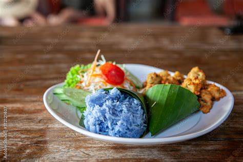 Butterfly-pea flower blue rice on a plate in Chiang Mai, Thailand Stock ...