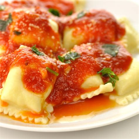 Cheese Ravioli with Fresh Tomato and Artichoke Sauce