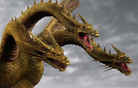 two golden dragon heads with their mouths open in front of a gray sky ...