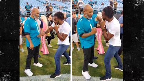 Mike Tyson Gives Sideline Fight Clinic to UFC Hall of Famer at NFL Game