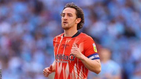 Tom Lockyer: Luton Town captain still in hospital after collapse in ...