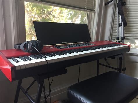 88-key Nord Piano 2 plus stand, grand piano pedals, and more | Reverb