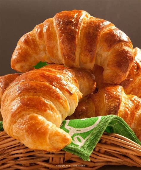 Croissant or The Queen of Breads in France is a laminated dough that ...