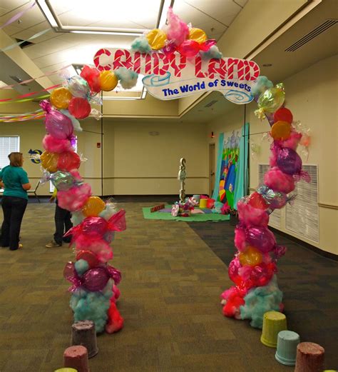 Candyland arch...We made candy from paper plates, balloons, and cotton ...