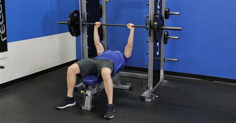 Smith Machine Bench Press: Video Exercise Guide & Tips