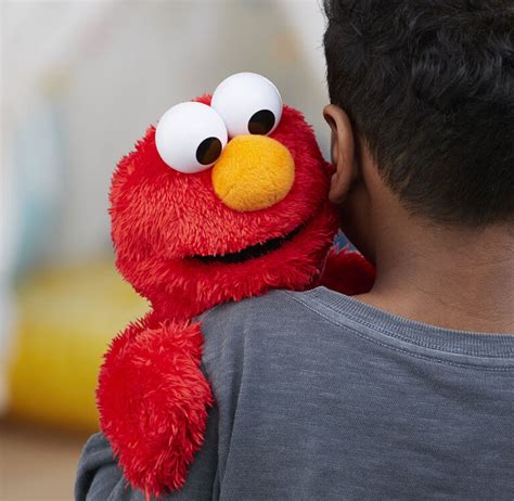 Sesame Street Love to Hug Elmo | Toys R Us Canada