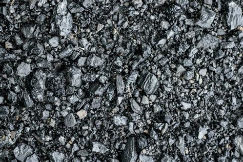 Black coal stones and pebbles from a coal store, Texture background for ...