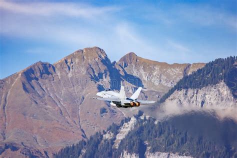 The Vapour Trail from a Jet Aircraft As it Flies through the Mountains ...