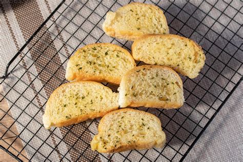 Slices of toasted bread with garlic and herbs 7196197 Stock Photo at ...