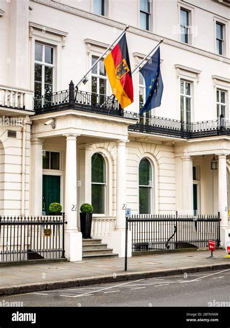 Embassy of Germany, London, UK. The German and EU flags flying over an ...