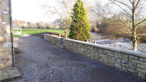 Flood Walls Using Redi-Rock Precast Modular Blocks