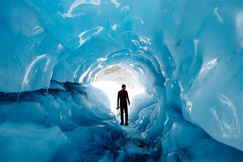 Glacier Ice Cave Exploring - Exploring the glacier ice caves of Fox ...