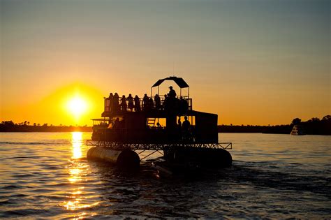 A sunset boat cruise on the Zambezi River is one of the 'must do ...