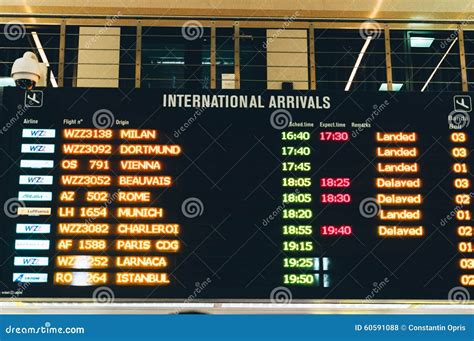 Arrivals Display Board At Airport Terminal Stock Photography ...