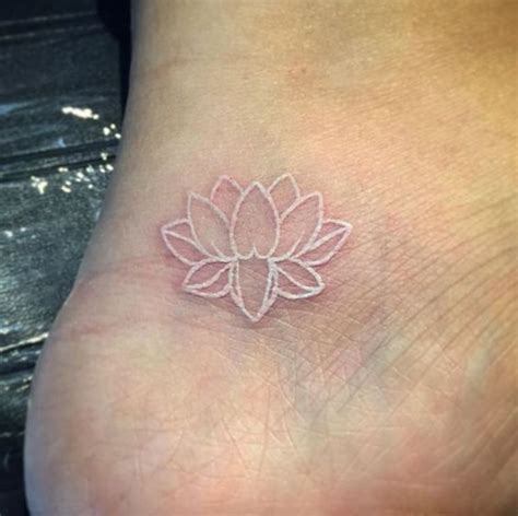 30 White Tattoos | White tattoo, Lotus flower tattoo design, Beautiful ...