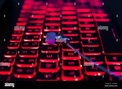 Backlit red keyboard in dark Stock Photo - Alamy