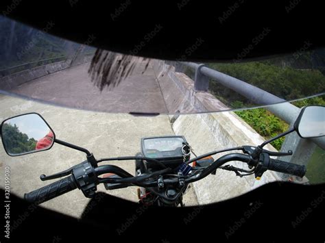 Motorcycle Seen Through Crash Helmet Stock Photo | Adobe Stock