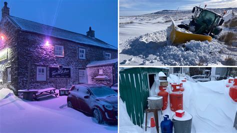 Inside the UK's highest pub the Tan Hill Inn when a yellow snow warning ...