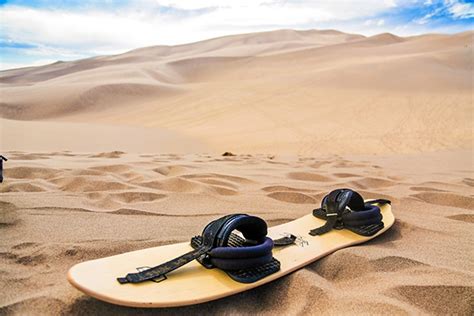 Sandboarding the Sand Dunes in Colorado | Wander The Map