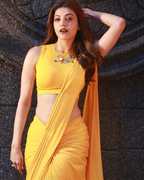 Kajal Aggarwal in yellow saree sleeveless blouse from Comali movie ...