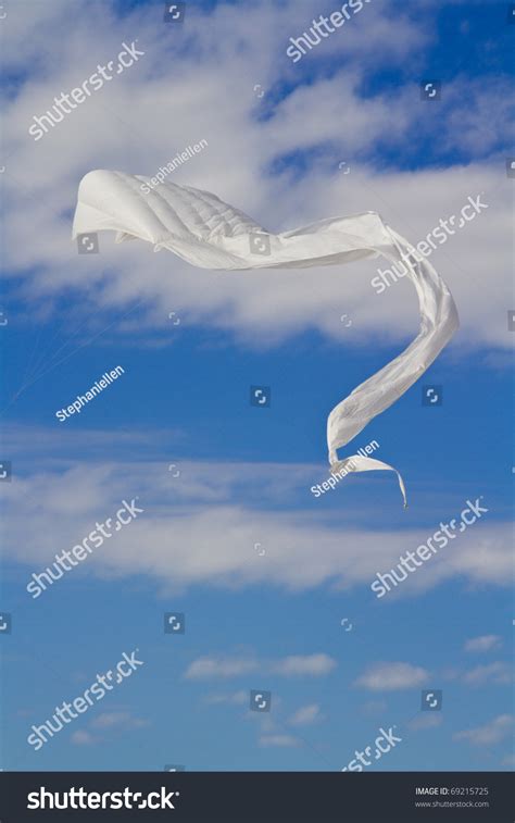 White Kite Flying Against A Beautiful Blue Sky Stock Photo 69215725 ...